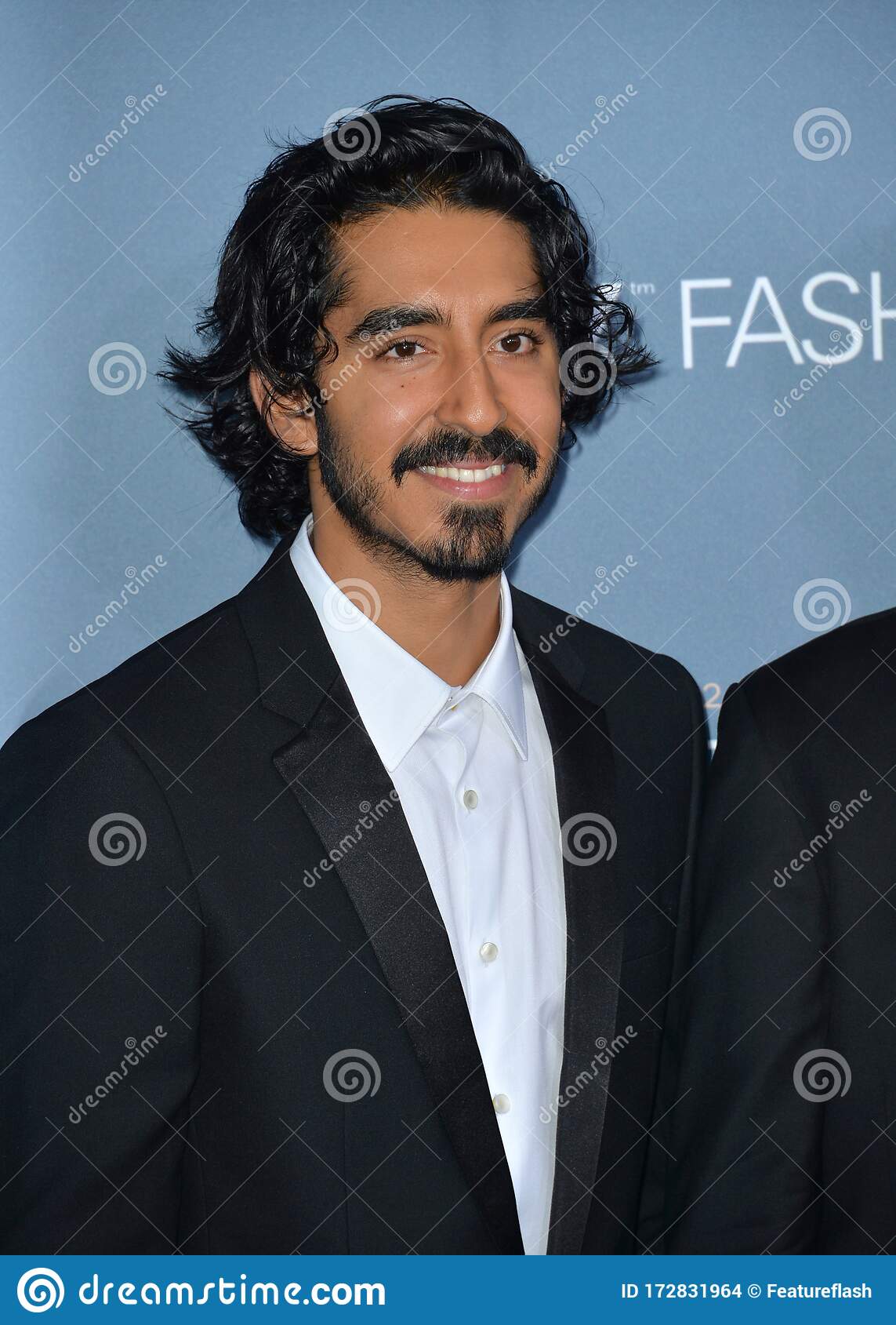 1143x1689  Dev Patel Stock Photos, Роялти Dev Patel Images | Депозитфотос