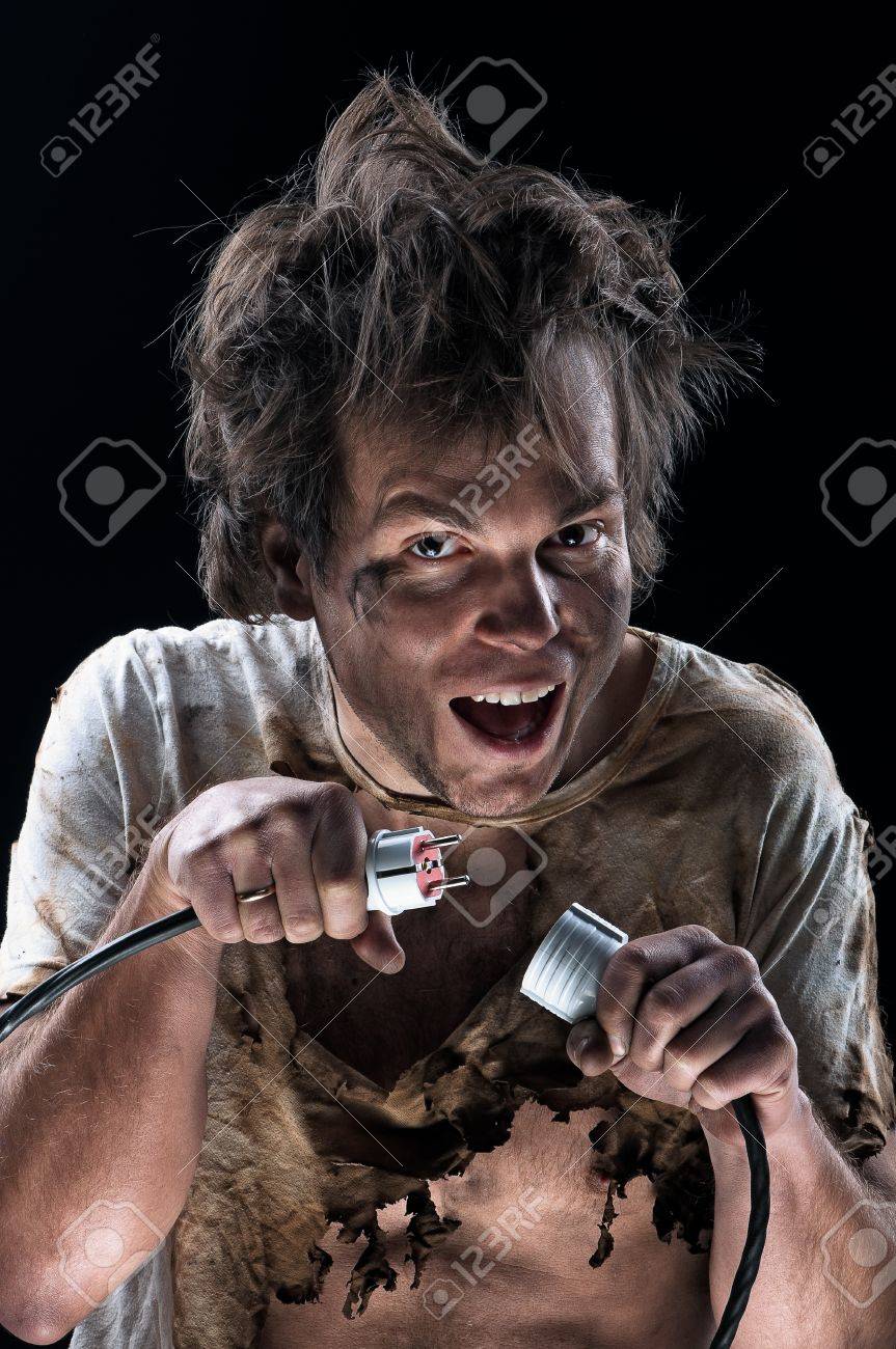 863x1300  Портрет Crazy Electrician на черном фоне Stock Photo, Picture и Free Lovelty. Изображение 12697011.