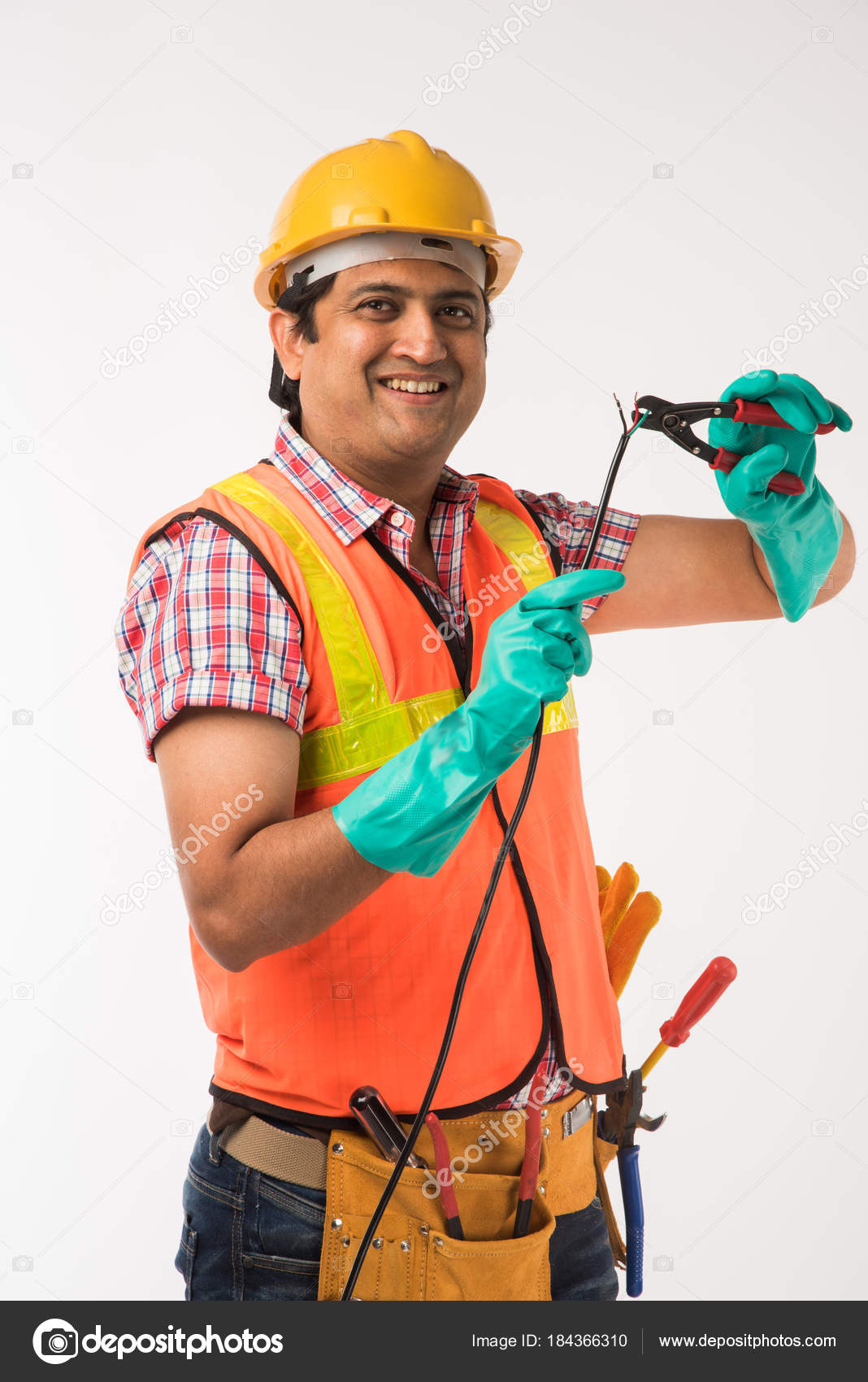 1068x1700  Индийский красивый электрический инженер -инженер, стоящий в изолированном белом фоне Стоковой Фото от © stockimagefactory.com 184366310