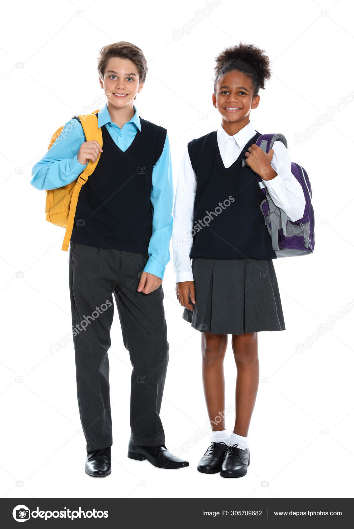 1138x1700  Счастливые ученики в школьной форме на белом фоне Stock Photo by © Newafrica 305709682