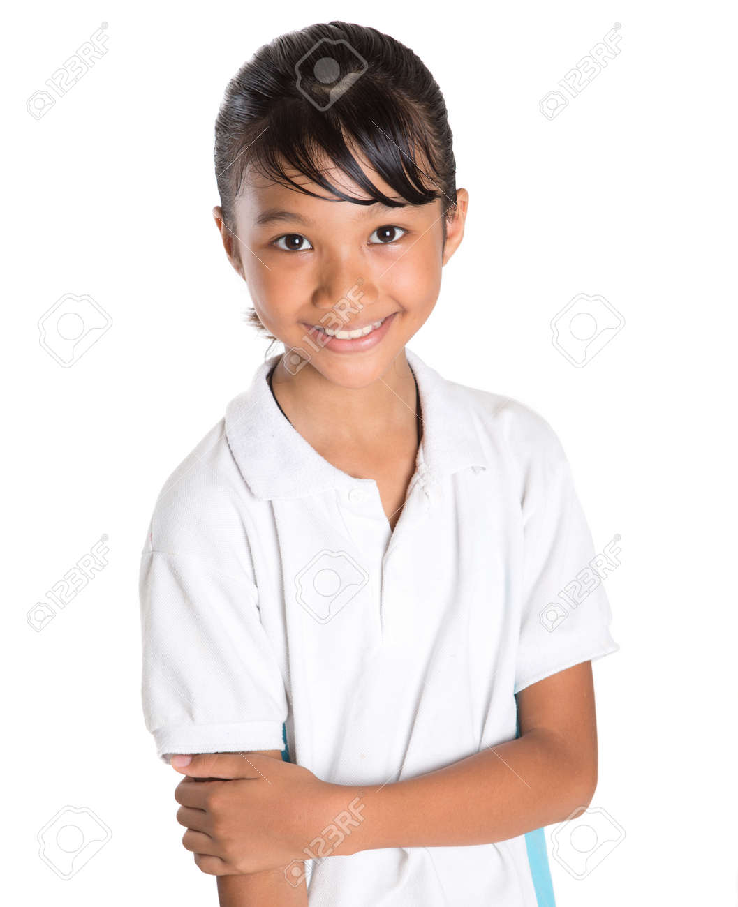 1057x1300  Молодая азиатская школьница в школьной форме над белым фоном Stock Photo, Picture и REALITCY Image. Изображение 29574073.