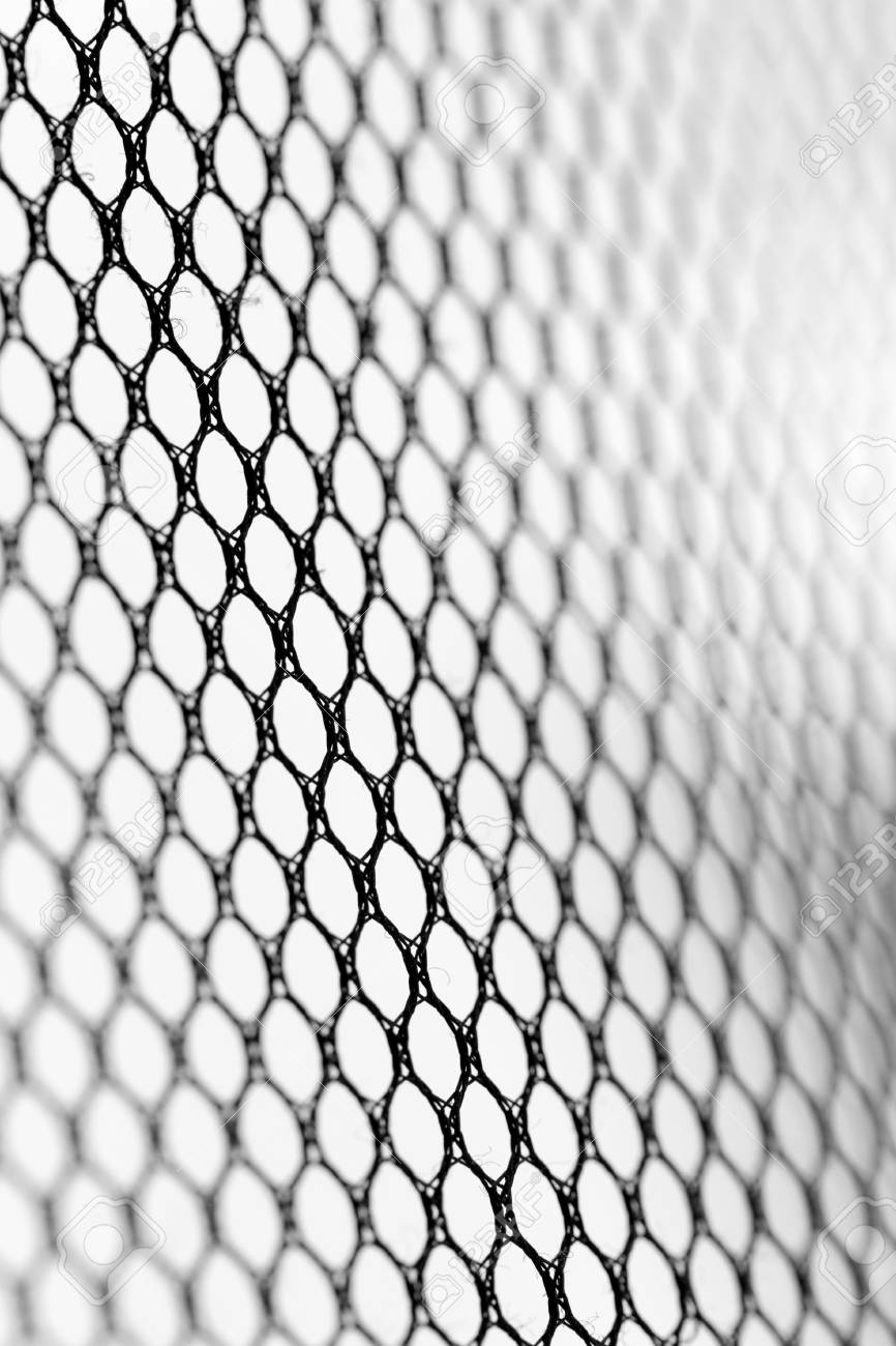 866x1300  Фон, черная синтетическая ткань с отверстиями Stock Photo, Picture и REALITCY Image. Изображение 101800156.