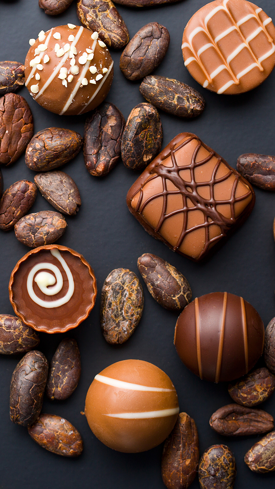 1080x1920  Фотографии Шоколад Конфеты Еда Сладости на черном фоне 1080x1920