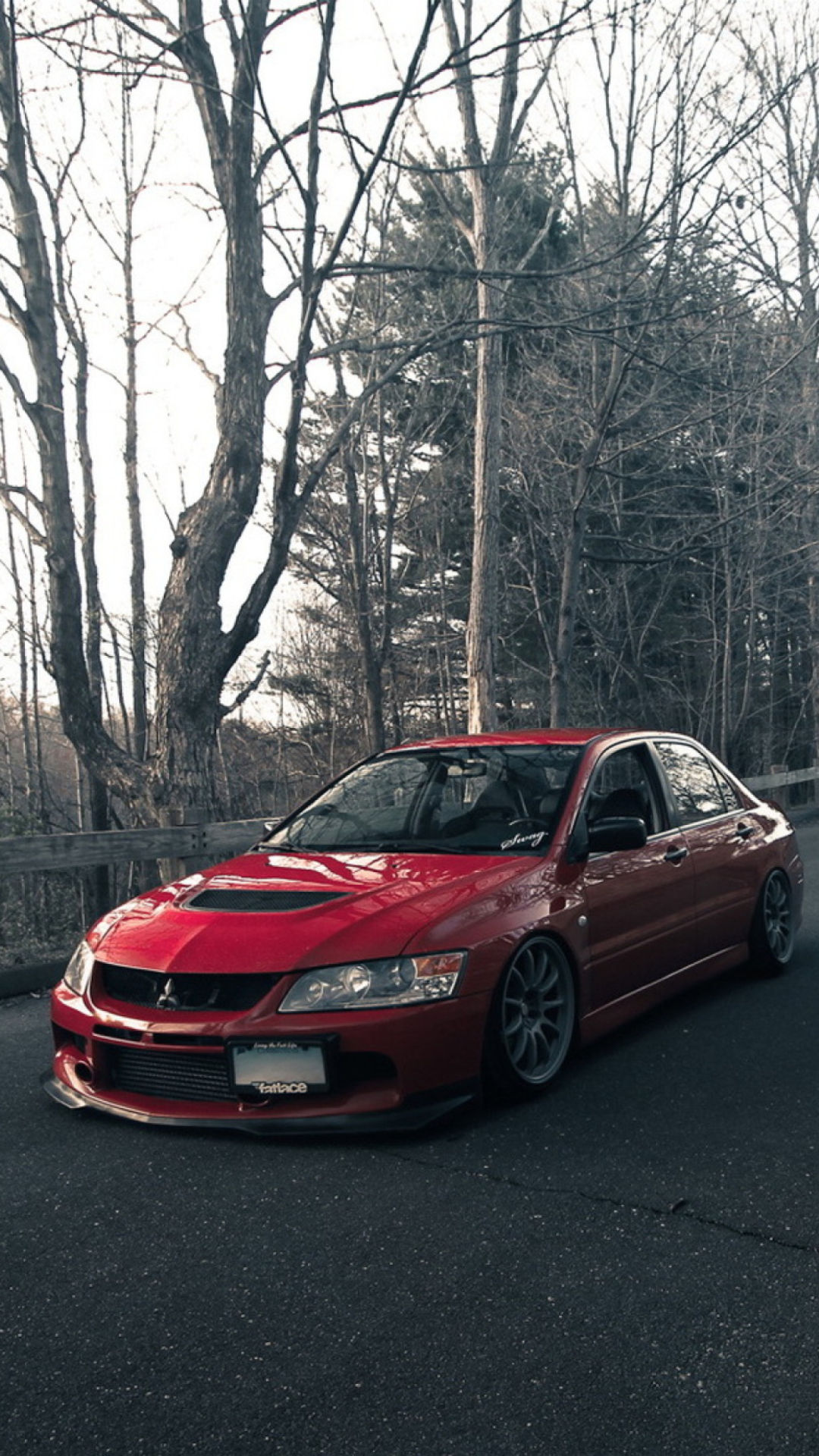 1080x1920  Скачать 938x1668 mitsubishi lancer evolution, mitsubishi, автомобиль,  красный, черный, вид спереди обои, картинки iphone 8/7/6s/6 for parallax
