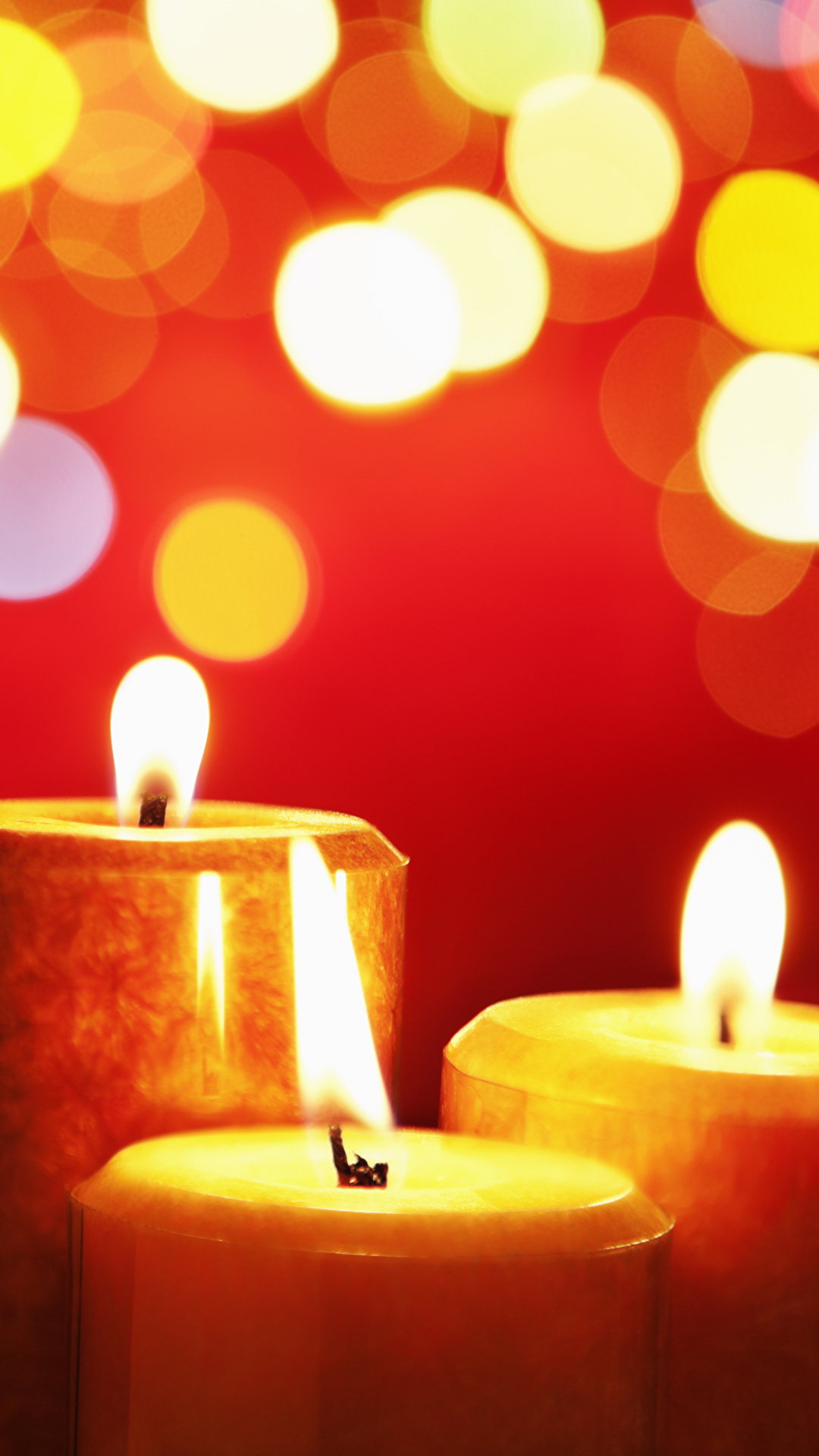1080x1920  Обои для рабочего стола пламя Свечи втроем 1080x1920