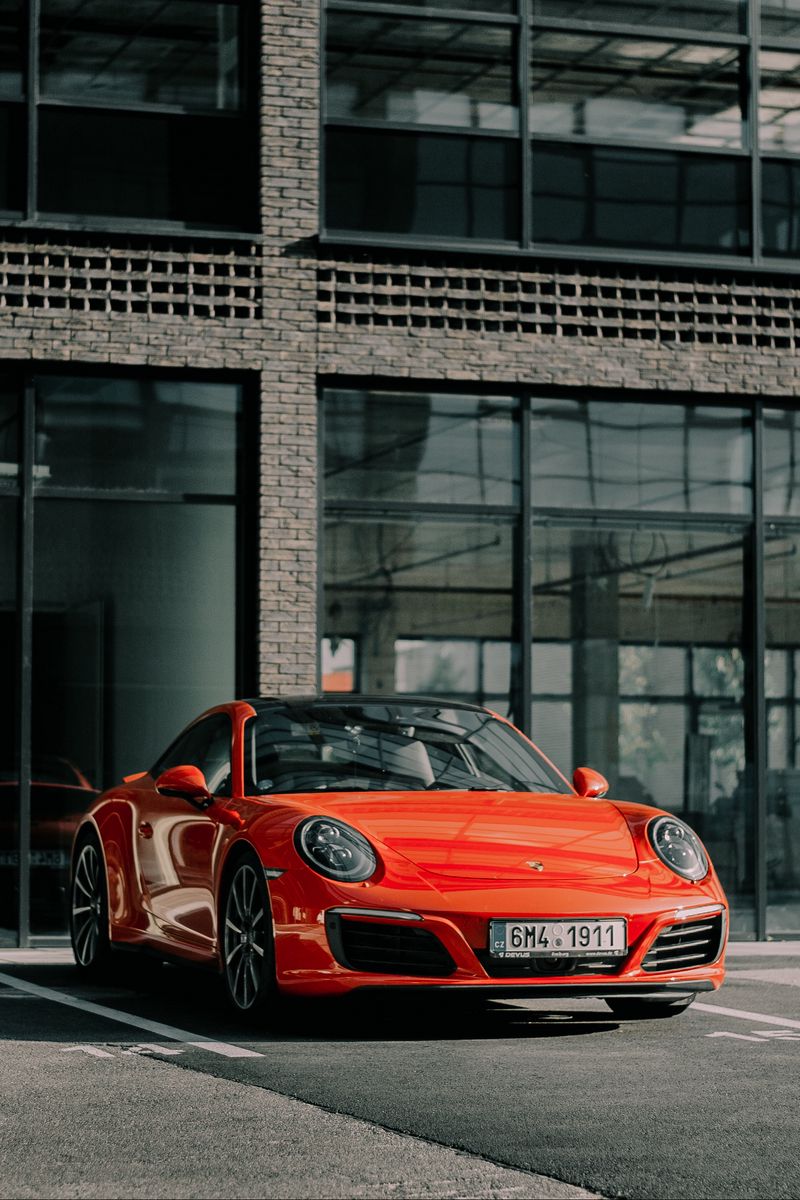 800x1200  Скачать 800x1200 porsche 911, porsche, спорткар, красный, вид спереди,  машина обои, картинки iphone 4s/4 for parallax