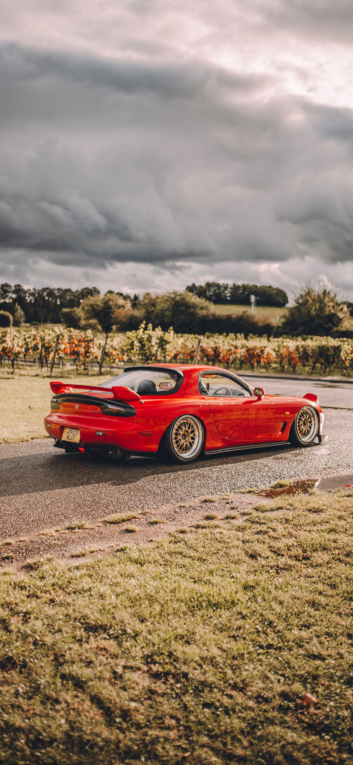 1125x2436  https://wallpapers-clan.com/wallpapers/mazda-rx-7-visual-stunning/