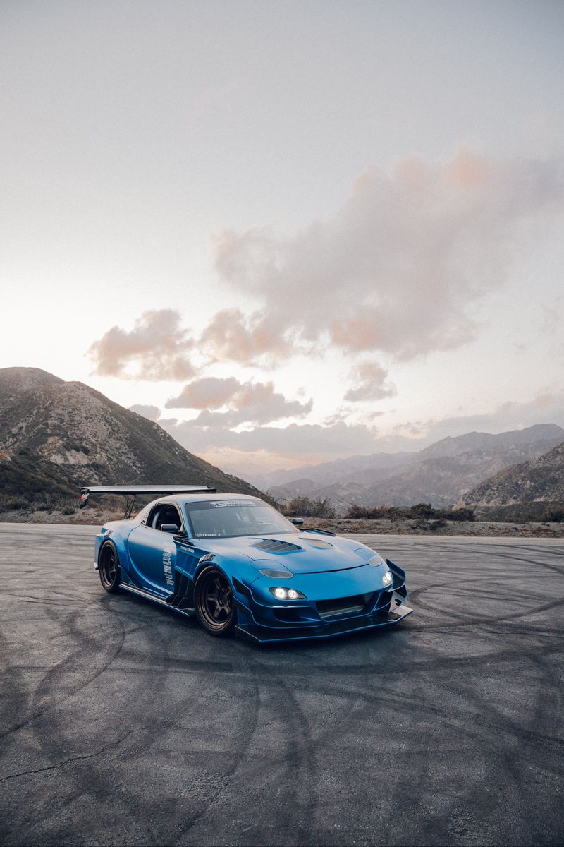 800x1200  Скачать золотые портретные обои Mazda Rx 7 | Обои.com