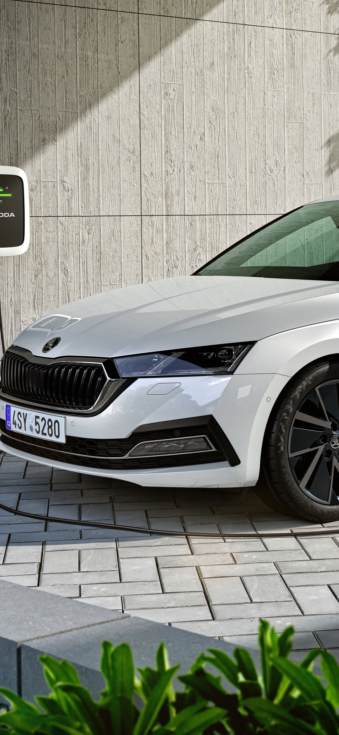 1125x2436  Skoda Octavia Electric 8k Iphone XS,Iphone 10,Iphone X HD 4k Обои, изображения, фоны, фото и картинки 1125x2436