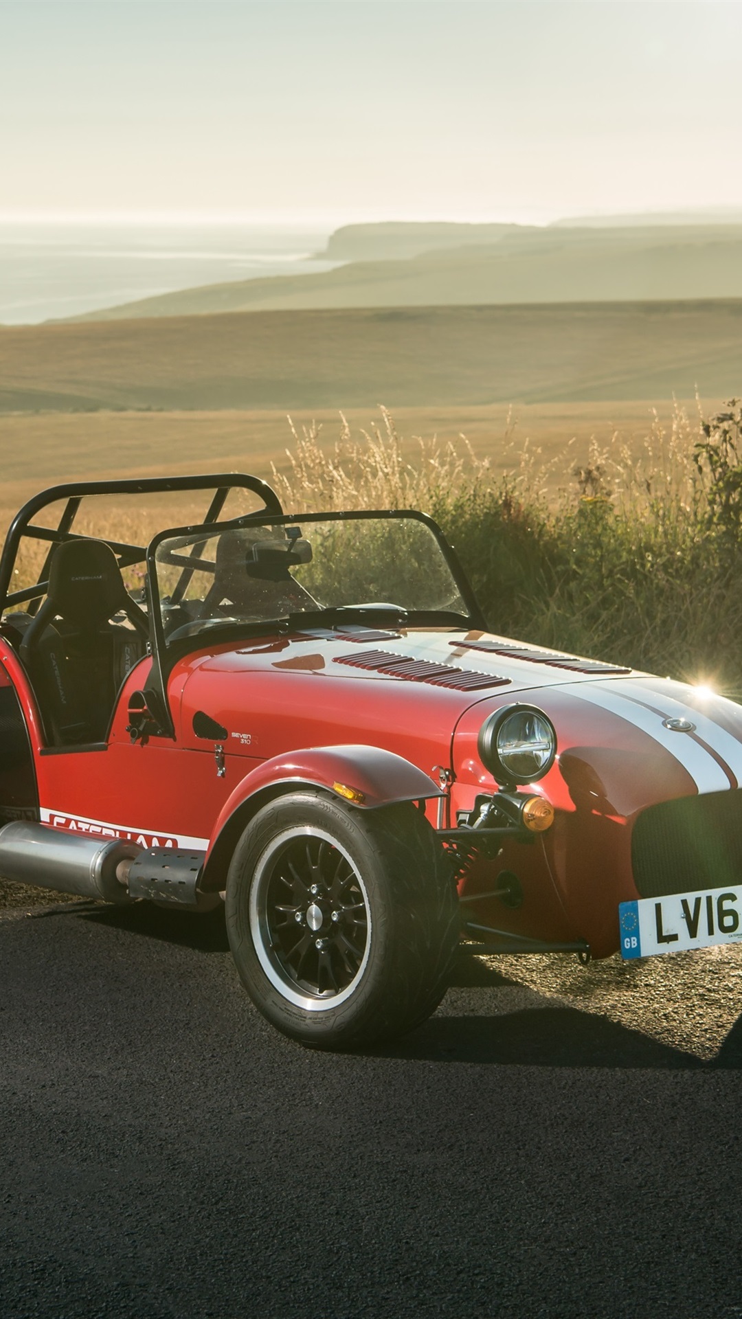 1080x1920  Caterham Seven 310R красный спортивный автомобиль 1080x1920 iPhone 8/7/6 / 6S Plus обои фоновое изображение 