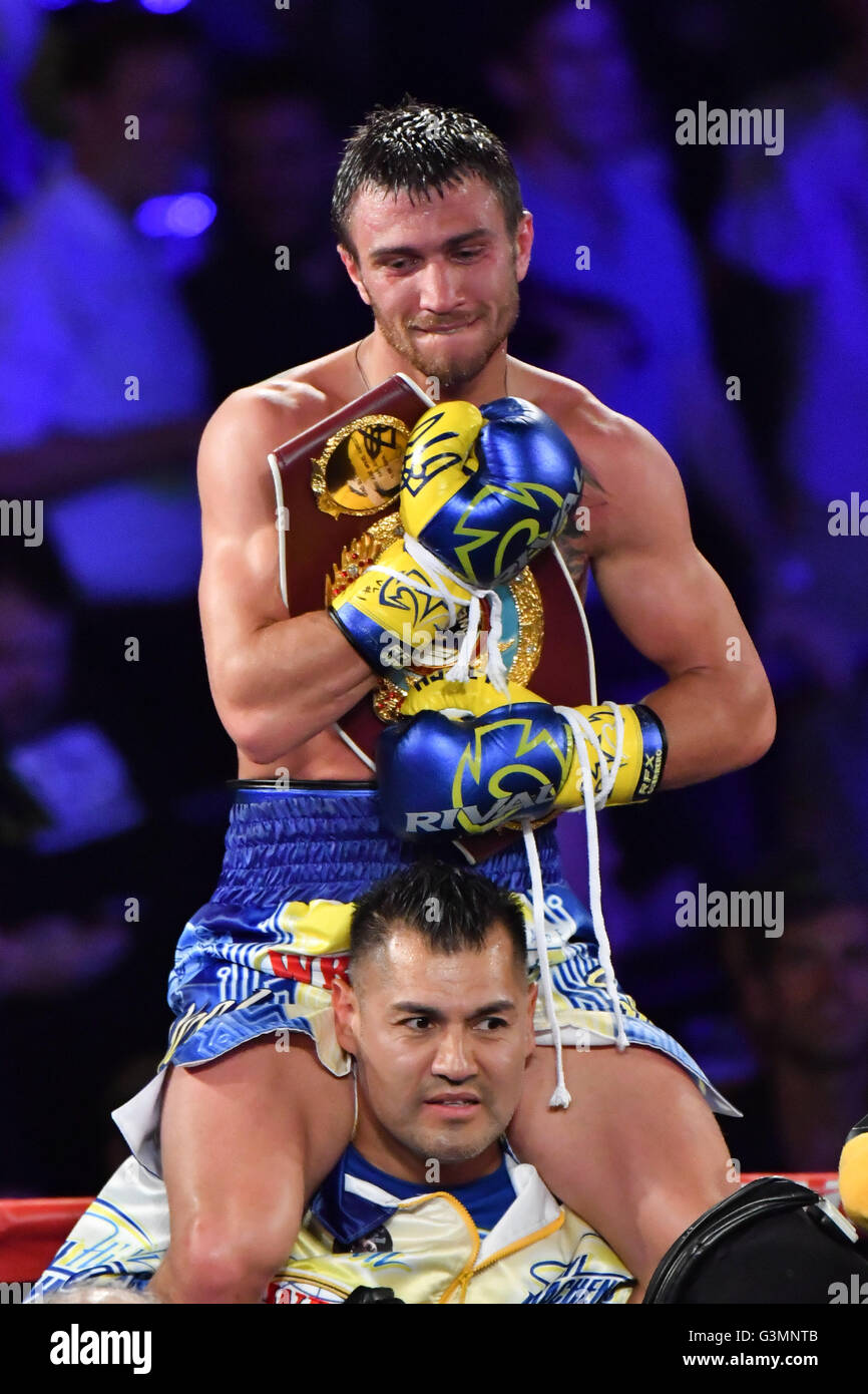 866x1390  Vasiliy Lomachenko Украина держит его ремни чемпионата Редакционное Стоковое Фото - Стоковое изображение ShuttTerstock