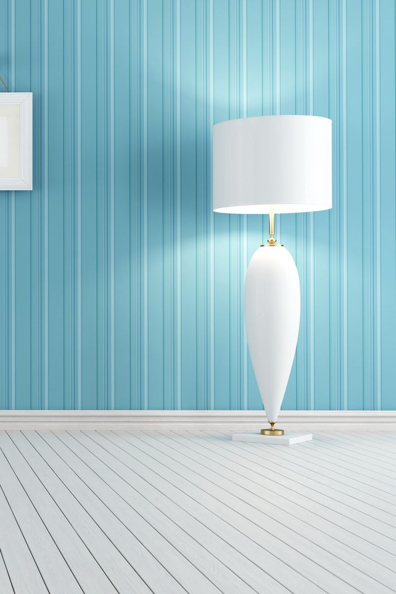 800x1200   Желтая кошка лежит на полу, уставившись на камеру 4K HD Animal Walpapers | HD обои | ID #36829 