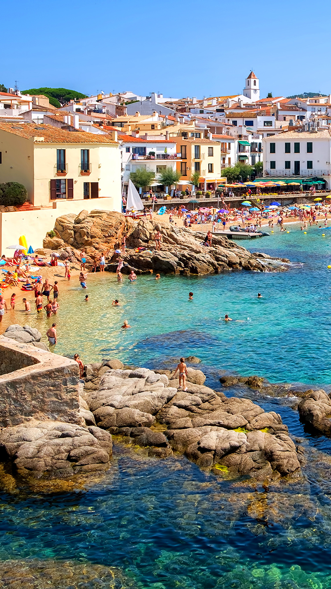 1080x1920  Image Испания Курорты Калелья Каталония Побережье Камни Города 1080x1920 